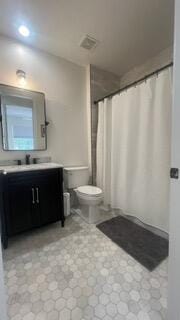 203 Evergrene Pkwy, Palm Beach Gardens, FL 33410 - full bathroom featuring toilet, vanity, tile patterned floors, and a shower with curtain
