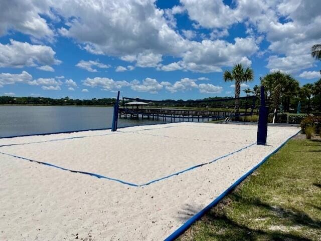 203 Evergrene Pkwy, Palm Beach Gardens, FL 33410 - view of home's community with volleyball court and a water view