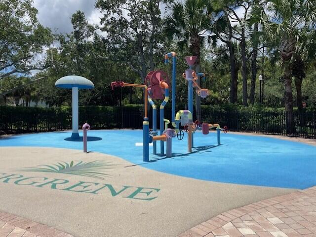 203 Evergrene Pkwy, Palm Beach Gardens, FL 33410 - view of jungle gym with fence