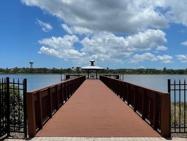 203 Evergrene Pkwy, Palm Beach Gardens, FL 33410 - dock with a water view and a gazebo
