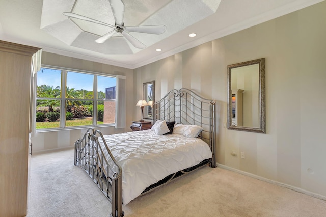 carpeted bedroom with baseboards, crown molding, recessed lighting, and a ceiling fan