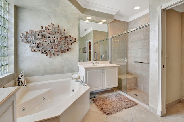 bathroom featuring crown molding, vanity, a shower stall, a tub with jets, and tile patterned flooring