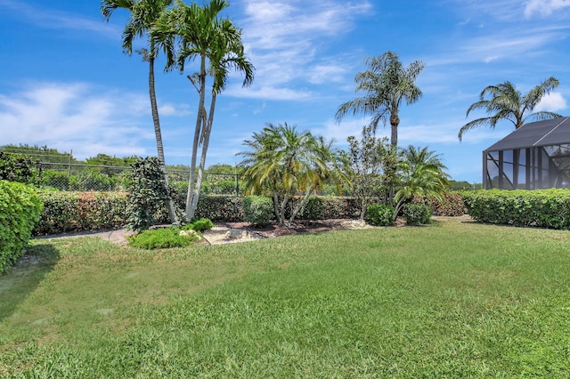 view of yard featuring a lanai
