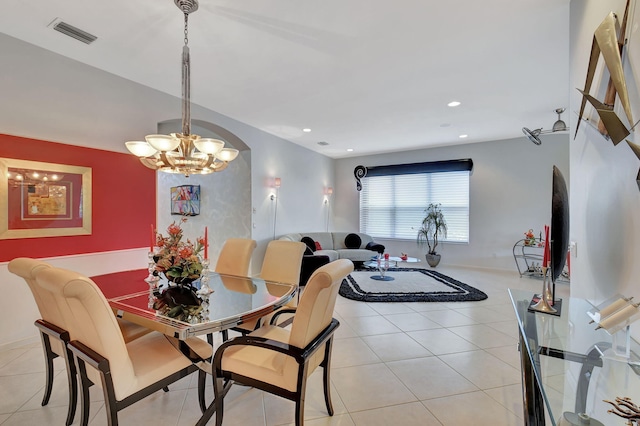 dining area featuring a chandelier, light tile patterned flooring, recessed lighting, and baseboards