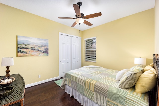 bedroom with wood finished floors, baseboards, a closet, and ceiling fan