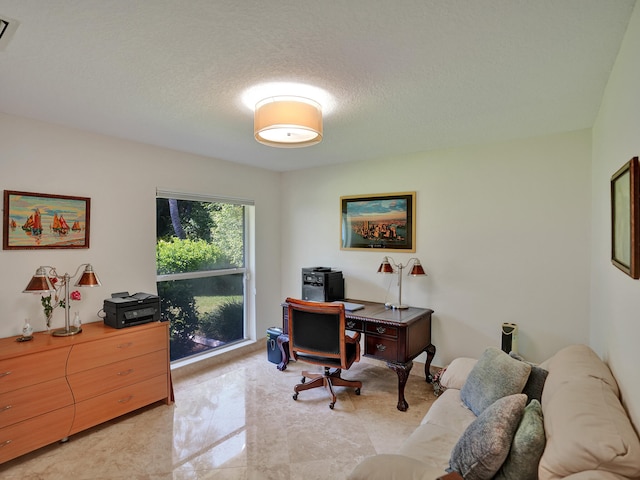 home office with a textured ceiling