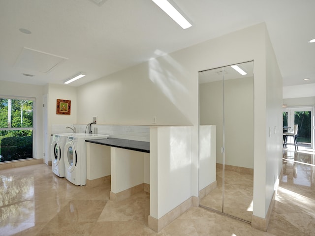 laundry room with washer and dryer