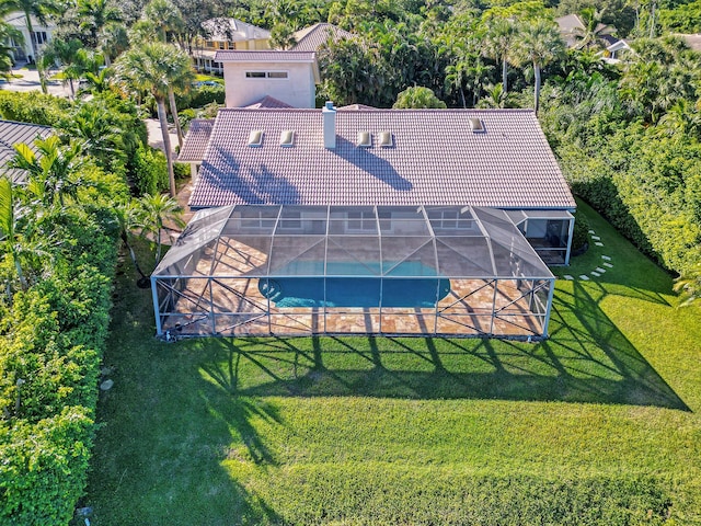 view of subject property featuring a pool