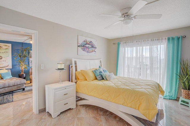 2724 N Garden Dr Unit 302, Lake Worth, FL 33461 - bedroom with a ceiling fan and light marble finish flooring