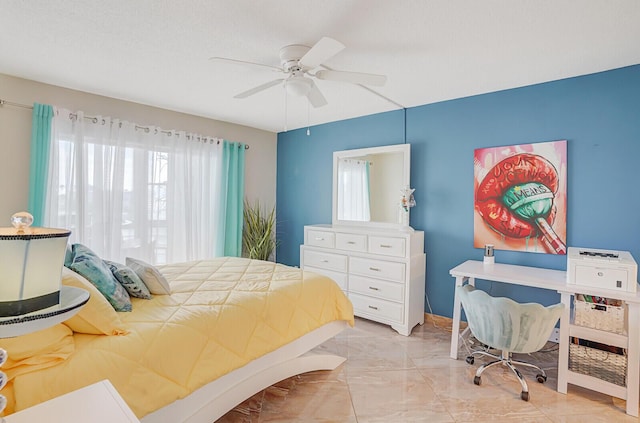 2724 N Garden Dr Unit 302, Lake Worth, FL 33461 - bedroom featuring light marble finish floors and a ceiling fan