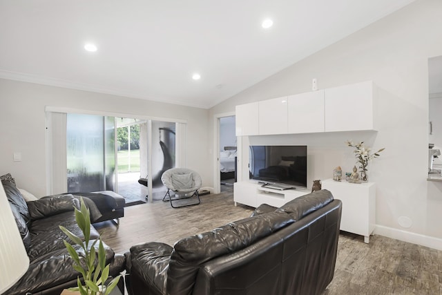 living area featuring light wood finished floors, ornamental molding, recessed lighting, vaulted ceiling, and baseboards
