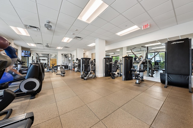 gym with a drop ceiling