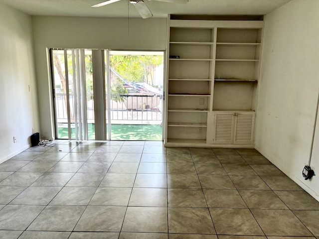 spare room with plenty of natural light, ceiling fan, and tile patterned flooring