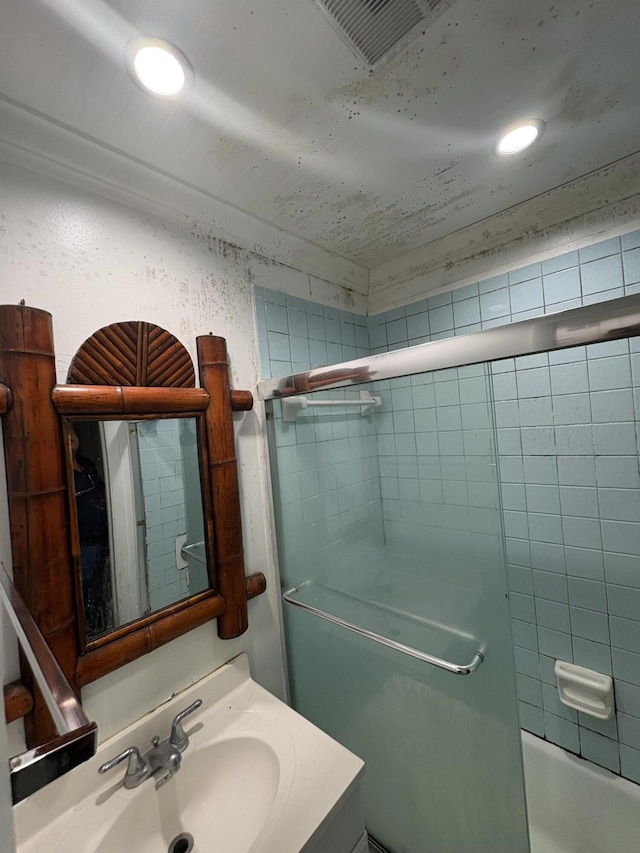 full bath featuring vanity and recessed lighting