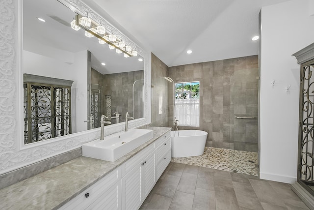 4841 Glenn Pine Ln, Boynton Beach, FL 33436 - full bathroom featuring tiled shower, recessed lighting, a freestanding tub, and vanity