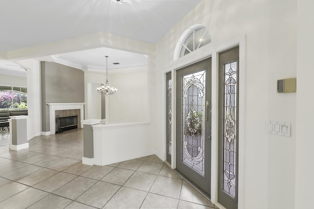4841 Glenn Pine Ln, Boynton Beach, FL 33436 - entryway with light tile patterned floors, a tile fireplace, baseboards, and a chandelier