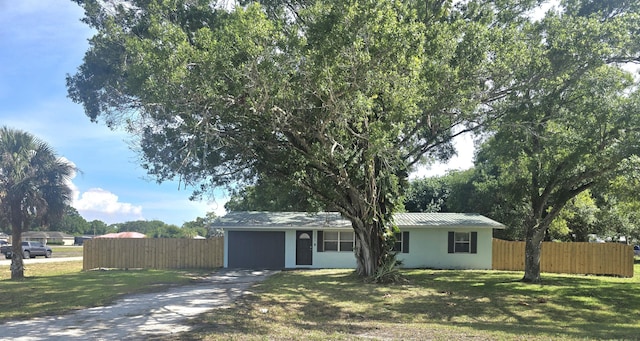 view of front of home featuring concrete driveway