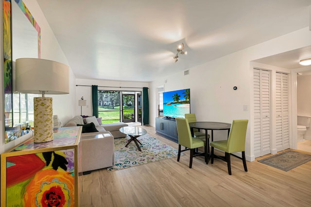 320 Norwood Ter Unit N114, Boca Raton, FL 33431 - living area featuring wood finished floors and rail lighting