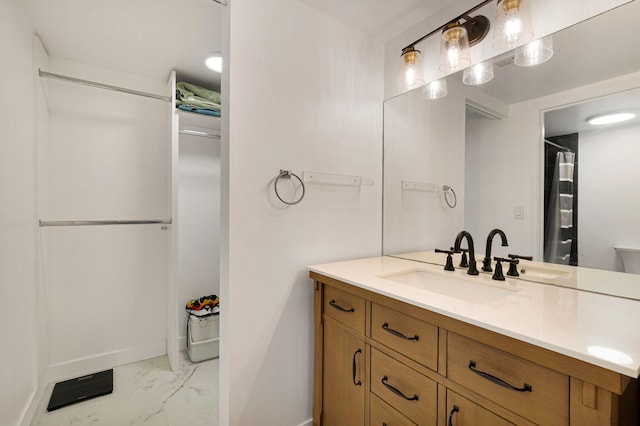 320 Norwood Ter Unit N114, Boca Raton, FL 33431 - full bathroom with marble finish flooring, baseboards, vanity, and curtained shower