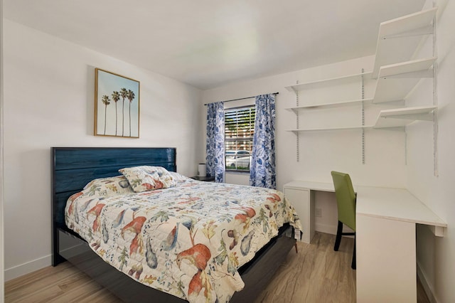 320 Norwood Ter Unit N114, Boca Raton, FL 33431 - bedroom featuring wood finished floors and baseboards
