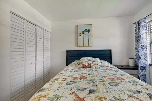 320 Norwood Ter Unit N114, Boca Raton, FL 33431 - bedroom featuring multiple windows and a closet