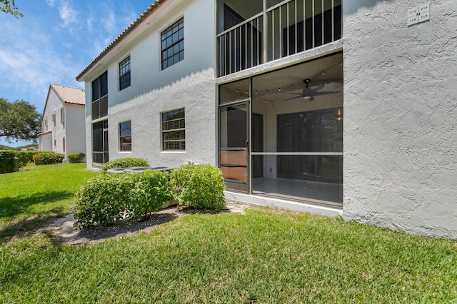 320 Norwood Ter Unit N114, Boca Raton, FL 33431 - rear view of house featuring stucco siding, a tile roof, and a yard