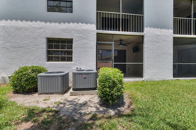 320 Norwood Ter Unit N114, Boca Raton, FL 33431 - view of property featuring central air condition unit