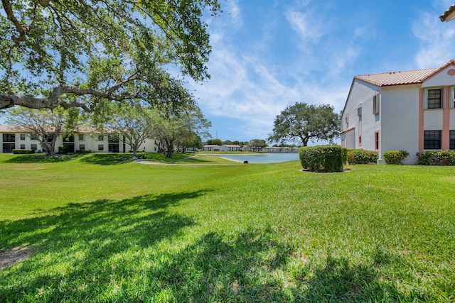 320 Norwood Ter Unit N114, Boca Raton, FL 33431 - view of grassy yard with a water view