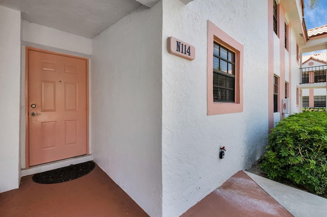 320 Norwood Ter Unit N114, Boca Raton, FL 33431 - property entrance featuring stucco siding