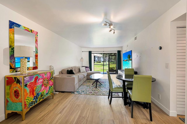 320 Norwood Ter Unit N114, Boca Raton, FL 33431 - dining room with wood finished floors and baseboards