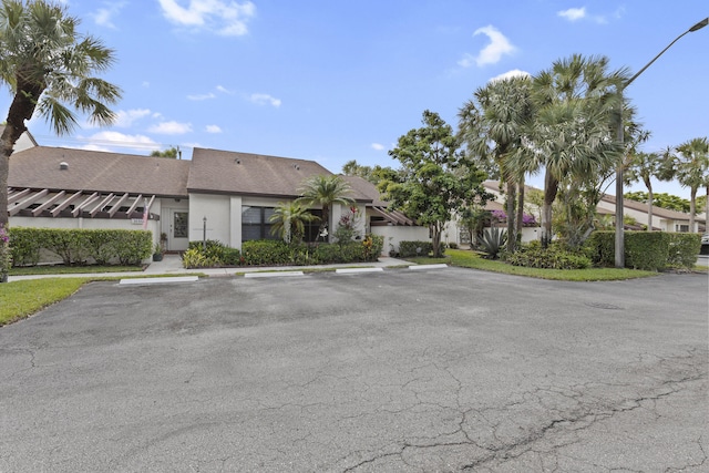 3646 English D Rd Unit D, Lake Worth, FL 33467 - view of building exterior with uncovered parking