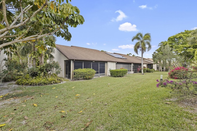 3646 English D Rd Unit D, Lake Worth, FL 33467 - view of grassy yard featuring a sunroom