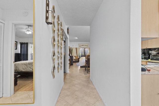 3646 English D Rd Unit D, Lake Worth, FL 33467 - hall featuring light tile patterned floors and baseboards
