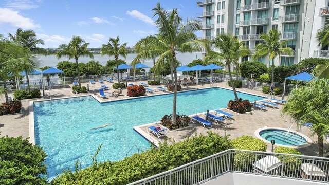 300 S Australian Ave Unit 801, West Palm Beach, FL 33401 - community pool with fence, a patio, and a community hot tub
