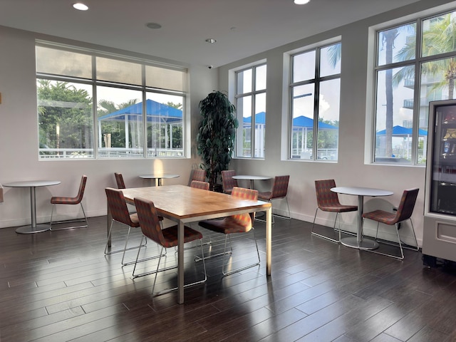 300 S Australian Ave Unit 801, West Palm Beach, FL 33401 - dining room featuring plenty of natural light, recessed lighting, dark wood-style floors, and baseboards