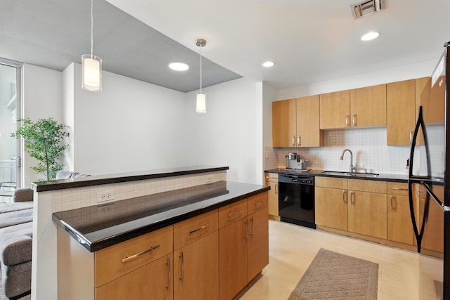 300 S Australian Ave Unit 801, West Palm Beach, FL 33401 - kitchen featuring black appliances, a sink, dark countertops, backsplash, and hanging light fixtures