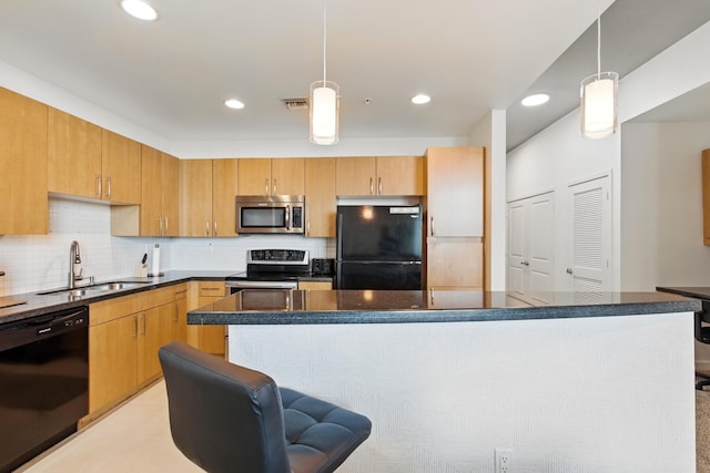 300 S Australian Ave Unit 801, West Palm Beach, FL 33401 - kitchen featuring black appliances, a sink, dark countertops, tasteful backsplash, and recessed lighting