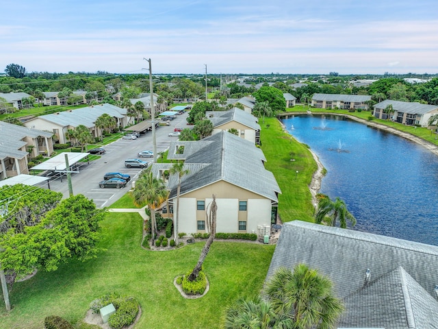 aerial perspective of suburban area featuring a large body of water