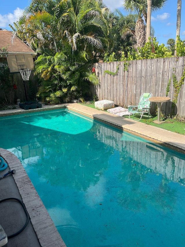 7514 Sierra Dr E, Boca Raton, FL 33433 - view of swimming pool with fence