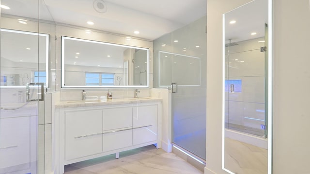 5100 Dupont Blvd Unit 7E, Fort Lauderdale, FL 33308 - bathroom featuring double vanity, a stall shower, marble look tile flooring, and recessed lighting