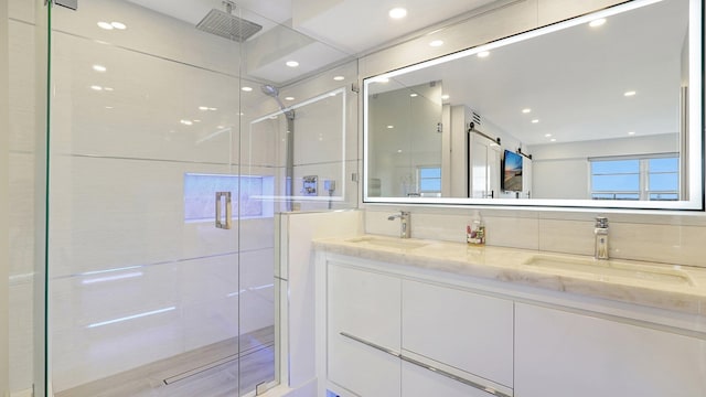 5100 Dupont Blvd Unit 7E, Fort Lauderdale, FL 33308 - bathroom with a stall shower, double vanity, and recessed lighting