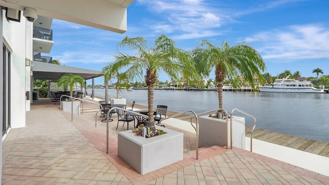 5100 Dupont Blvd Unit 7E, Fort Lauderdale, FL 33308 - view of patio with a water view and a dock