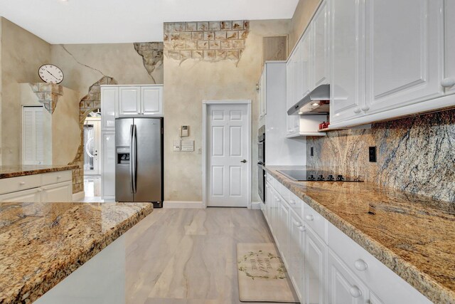19236 Bay Leaf Ct, Boca Raton, FL 33498 - kitchen featuring appliances with stainless steel finishes, ventilation hood, white cabinetry, and light marble finish floors
