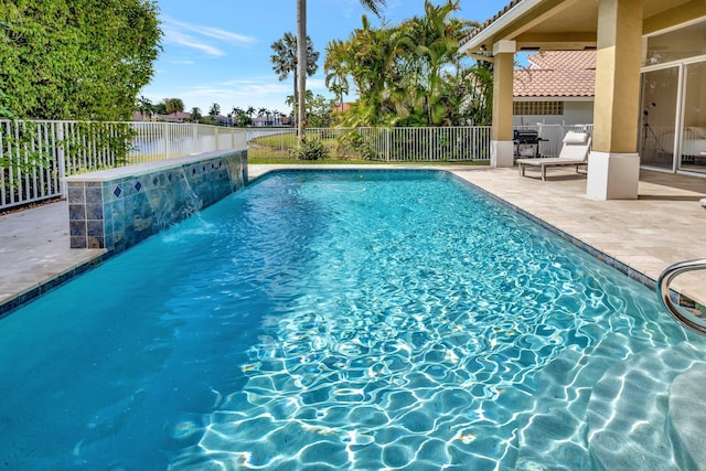 19236 Bay Leaf Ct, Boca Raton, FL 33498 - view of swimming pool featuring a patio and a fenced backyard