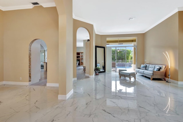 19236 Bay Leaf Ct, Boca Raton, FL 33498 - living area with arched walkways, crown molding, marble tiled flooring, and baseboards