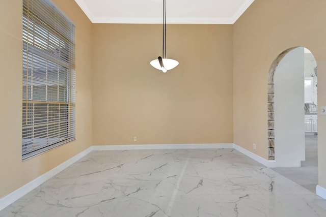 19236 Bay Leaf Ct, Boca Raton, FL 33498 - spare room with arched walkways, baseboards, ornamental molding, and light marble finish flooring
