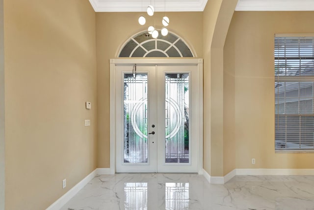 19236 Bay Leaf Ct, Boca Raton, FL 33498 - entryway with marble finish floors, french doors, arched walkways, baseboards, and ornamental molding