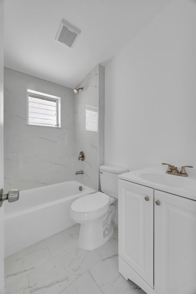 907 Skylark Dr, Fort Pierce, FL 34982 - full bathroom with toilet, shower / tub combination, marble finish flooring, and vanity