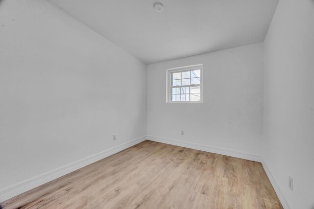 907 Skylark Dr, Fort Pierce, FL 34982 - spare room with wood finished floors, baseboards, and a smoke detector