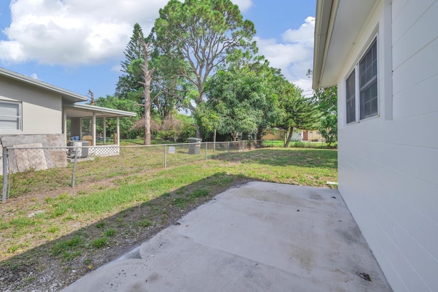 907 Skylark Dr, Fort Pierce, FL 34982 - view of yard with central air condition unit and a patio